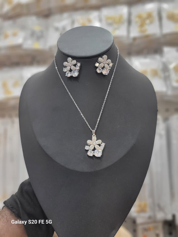 Female earrings, chain and pendant