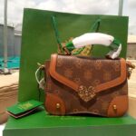 Luxury Monogram Top-Handle Satchel with Ornate Heart Clasp