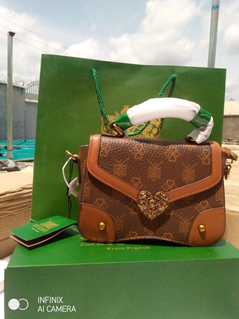 Luxury Monogram Top-Handle Satchel with Ornate Heart Clasp